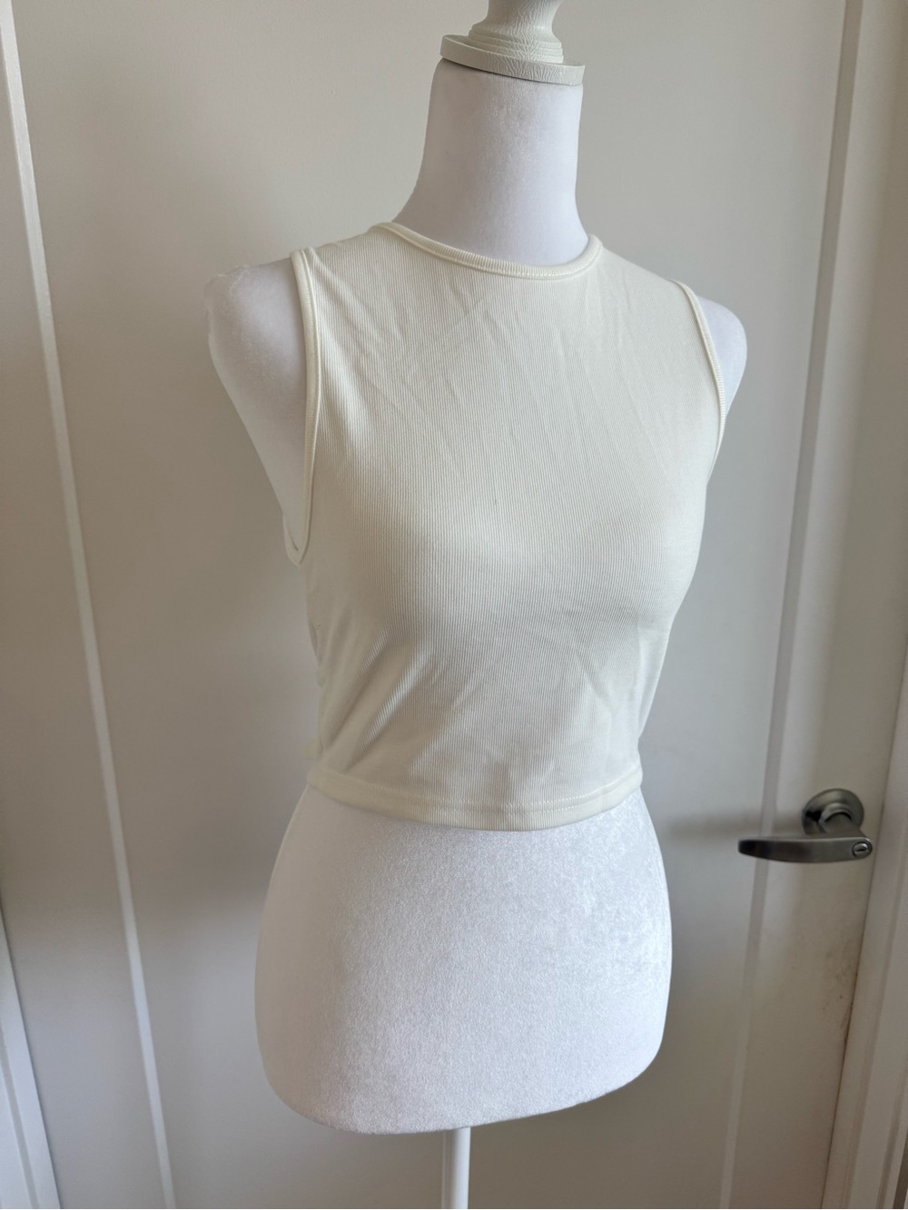 About Us- Women's Sleeveless Crewneck Crop Tank - Cream
